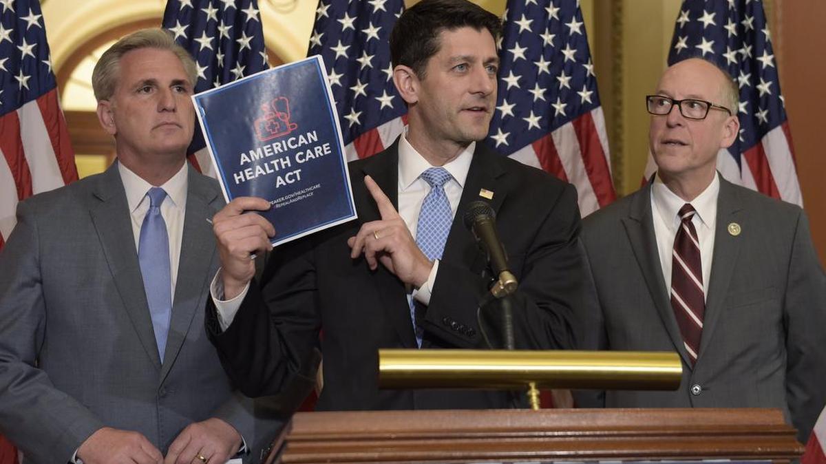 House Speaker Paul Ryan of Wisconsin, center, standing with Energy and Commerce Committee Chairman Greg Walden, R-Oregon, right, and House Majority Whip Kevin McCarthy, R-California, left, speaks during a news conference on the American Health Care Act on Capitol Hill in Washington, Tuesday, March 7, 2017.