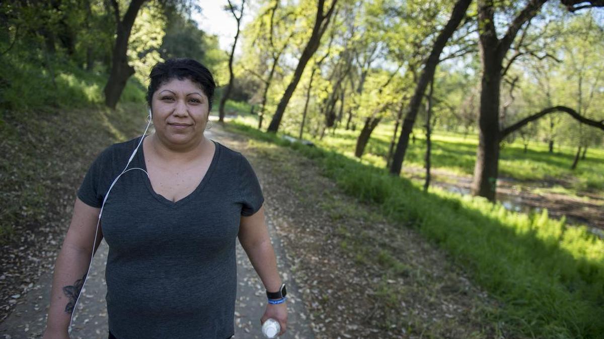 Maria Ibarra hikes on a trail Friday, March 18, 2016, at Arcade Creek Park Preserve in Citrus Heights. Her diagnosis with Type 2 diabetes six years ago prodded Ibarra to adopt health-conscious habits.
