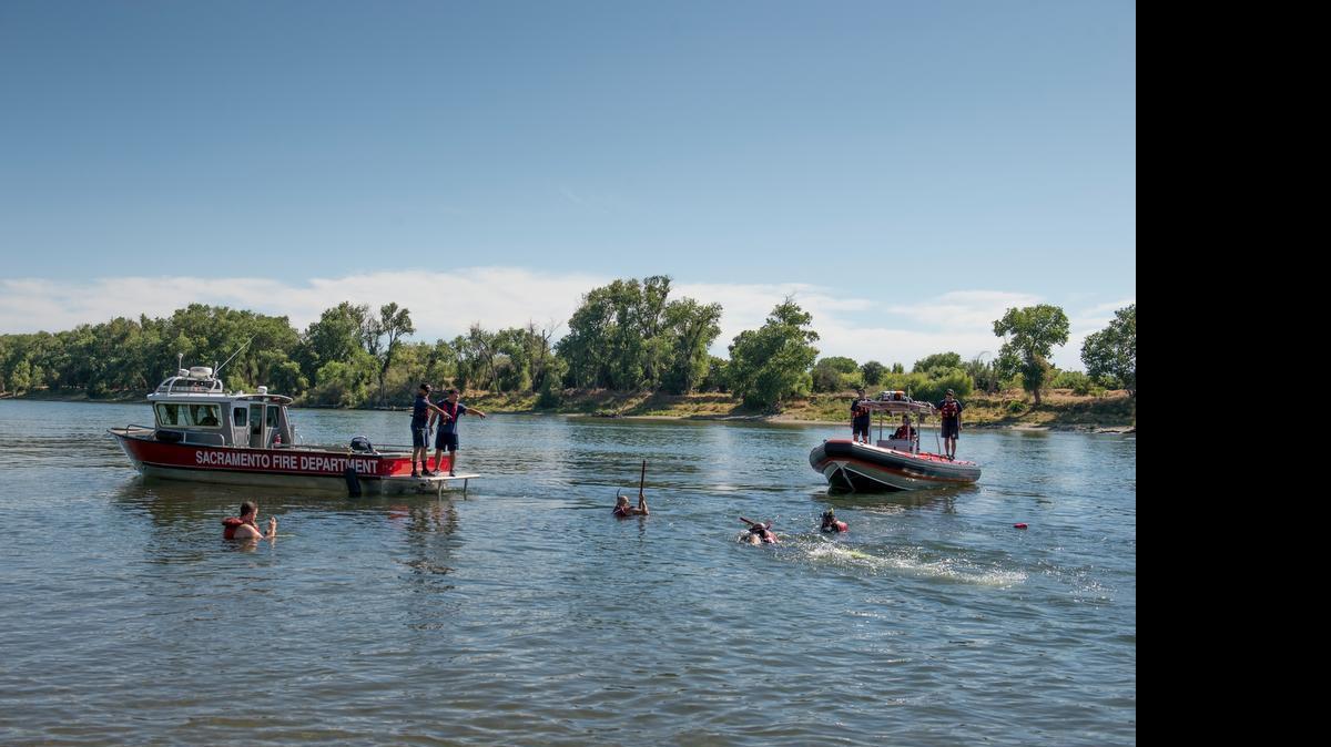 
Sacramento Fire Department and Drowning Accident Rescue Team search for Aasha Sharma, 27, where she disappeared at the confluence of the Sacramento and American rivers at Discovery Park on Monday afternoon,. A body believed to be Sharma’s was found on Thursday near the Tower Bridge.
