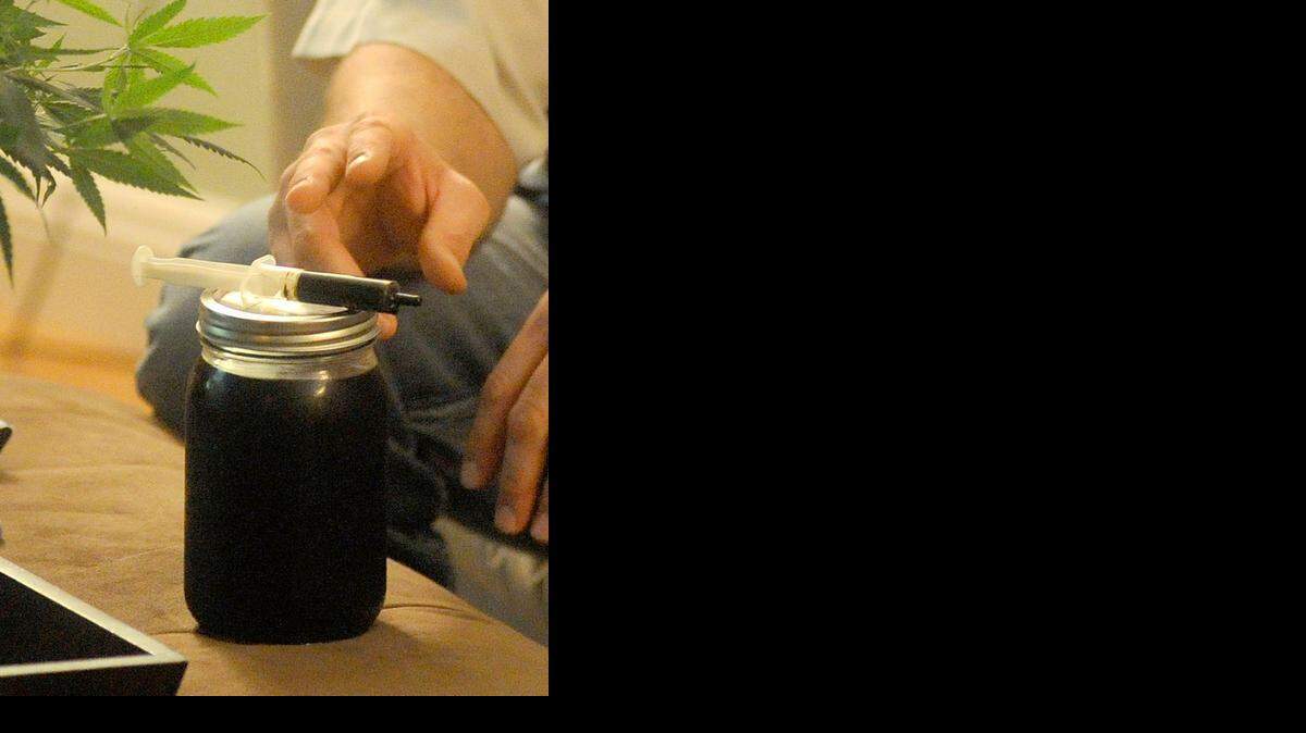 A marijuana grower <137>Stephen Boski <137>shows <137>a dropper and a jar full of the CBD Cannabinol <137>concentrate that is used by <137>to administer the medicine to<137> epilepsy patients<137> suffering from severe and rare forms of epilepsy from his home this year<137>. A state appellate court said it <137> in Sacramento has ruled that “concentrated cannabis” <137>qualifies legally as marijuana<137> for purposes of medical use<137>.