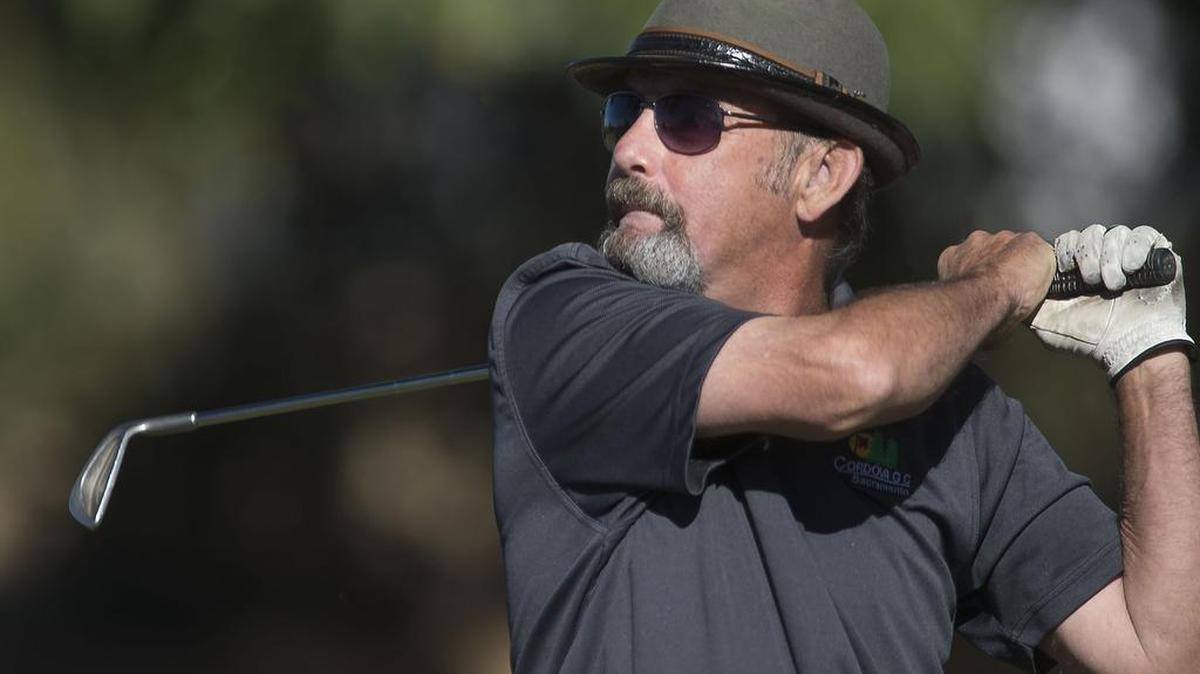 David Johnson plays at Cordova Golf Course in Rancho Cordova . The Alzheimer’s patient is still golfing and driving four years after his diagnosis. The disease killed his father and other relatives.