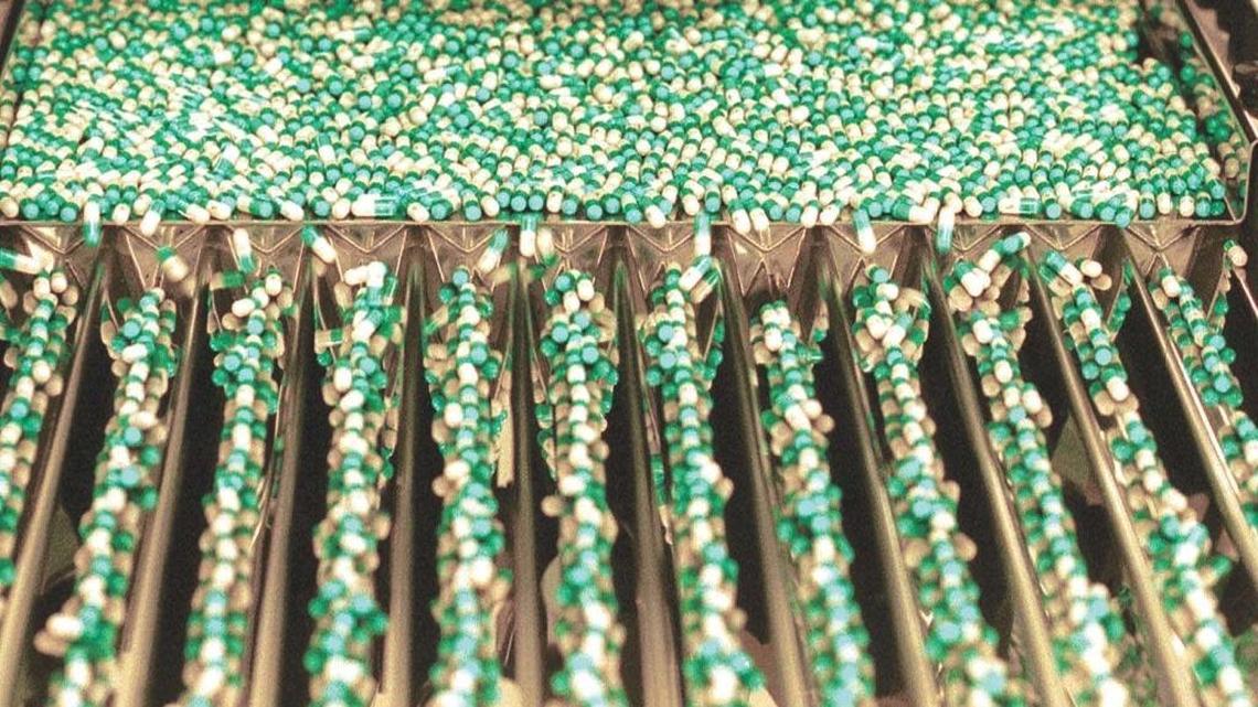 Capsules of fluoxetine, the chemical name for the popular antidepressant Prozac, are sorted at a packaging line at Barr Laboratories in Forest, Va., in 2001.