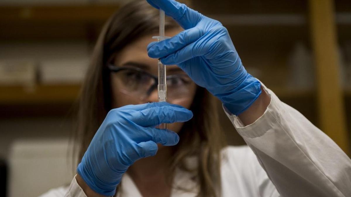 Sacramento State student Ella Mokrushin prepares a sample to be separated into specific sizes on Wednesday, May 4, 2016. “The process of reactions and identifying what you have really drives you,” she said. “That’s the exciting part – trying to figure out what did you make? And did it work?”