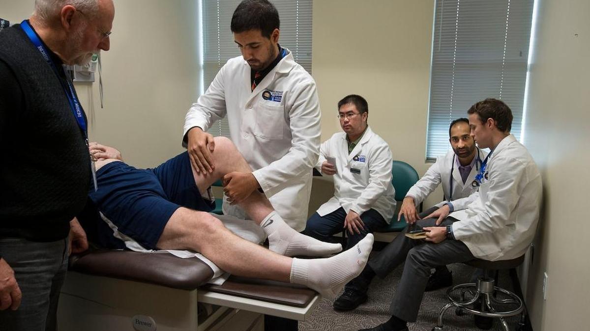 Medical instructor Hanns Haesslein, left, coaches medical students Charndip Clair, Jonathan Huang, Zain Lalani, and Tyler Ellis through an orthopedic exam at California Northstate University College of Medicine in Elk Grove in 2016. The private college was granted full accreditation in July by the Liaison Committee on Medical Education, marking a major milestone for the campus.