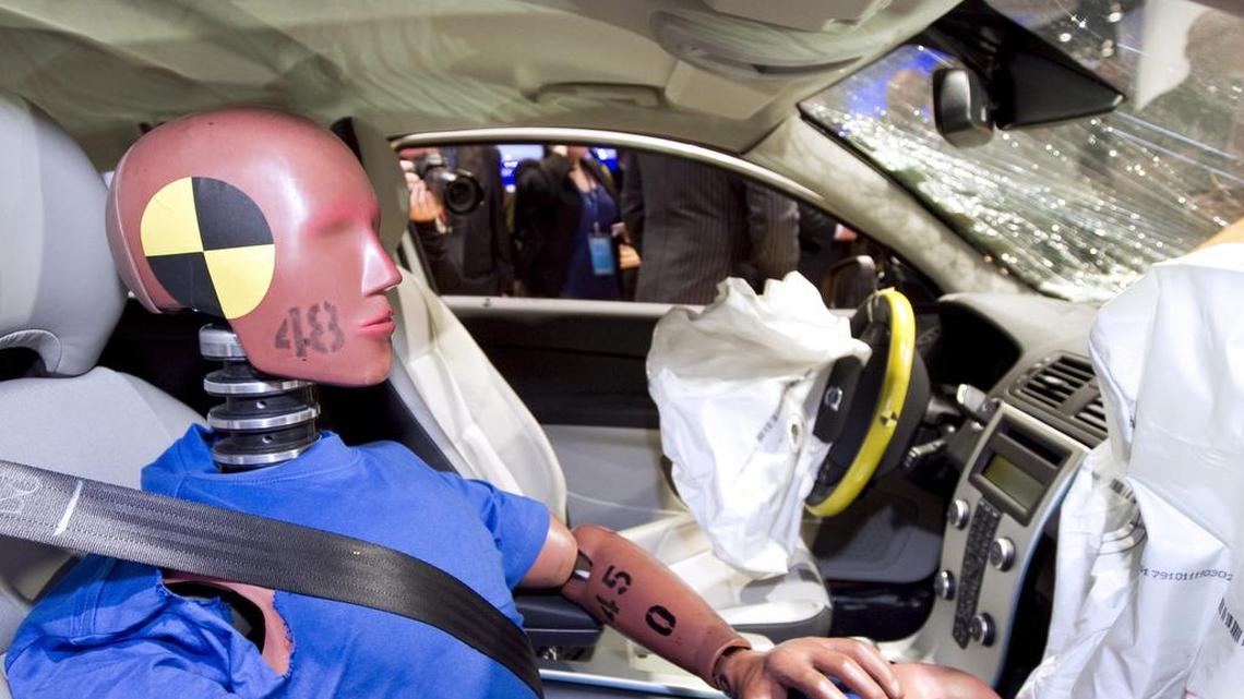 A 2011 photo shows a crash test dummy in a Volvo vehicle at the North American International Auto Show (NAIAS) in Detroit.