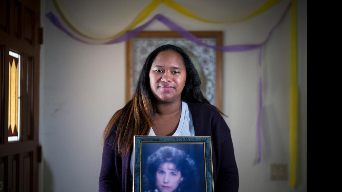 Nicole Muldrow, 28, holds a picture of her mother, Amalia Muldrow, who died in 2008. “Nothing’s ever going to be as hard as that,” she said of the loss.