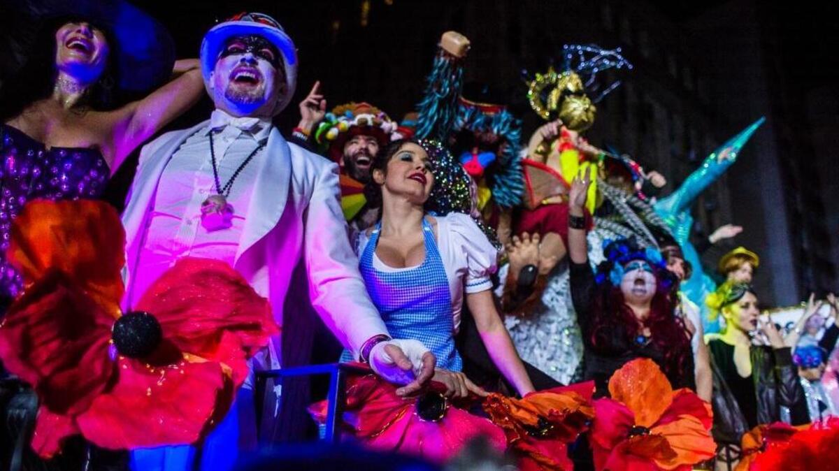 Revelers march during the Greenwich Village Halloween Parade in New York on Oct. 31, 2016. A recent report suggests searching for a costume could leave you with head lice.