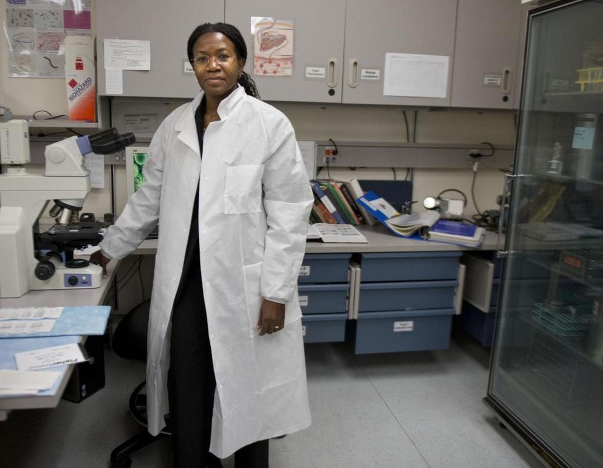 Dr. Olivia Kasirye, who is the Sacramento County Public Health Officer in charge of keeping residents healthy, following flu trends, outreach to communities on health matters at the Sacramento County Public Health Lab on Friday, Feb. 7, 2014. Kasirye in March 2026 will retire after 14 years as the county’s public health officer.