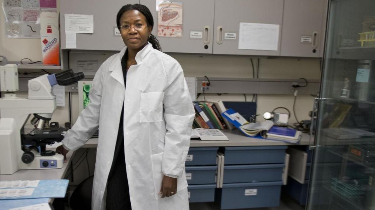 Dr. Olivia Kasirye, who is the Sacramento County Public Health Officer in charge of keeping residents healthy, following flu trends, outreach to communities on health matters at the Sacramento County Public Health Lab on Friday, Feb. 7, 2014. Born, raised and schooled in medicine in Uganda, she is studious but soft-spoken and is the boss of 176 people. 