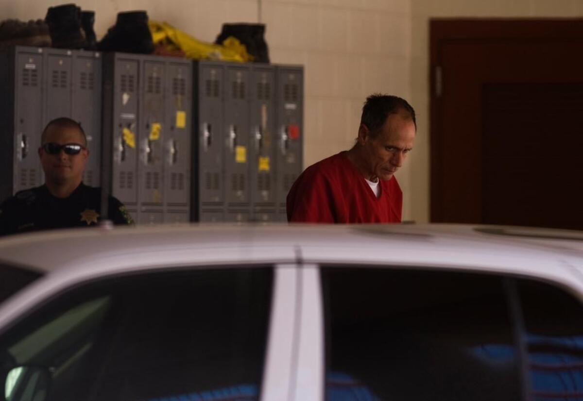 Phillip Craig Garrido is escorted by deputies at El Dorado County Jail to car carrying him to his arraignment at the El Dorado Superior Court in Placerville on Friday, Aug. 28, 2009. Garrido and his wife, Nancy Garrido, ultimately pleaded to multiple charges related to the 1991 abduction of Jaycee Lee Dugard, and both were sentenced to long stretches in state prison.
