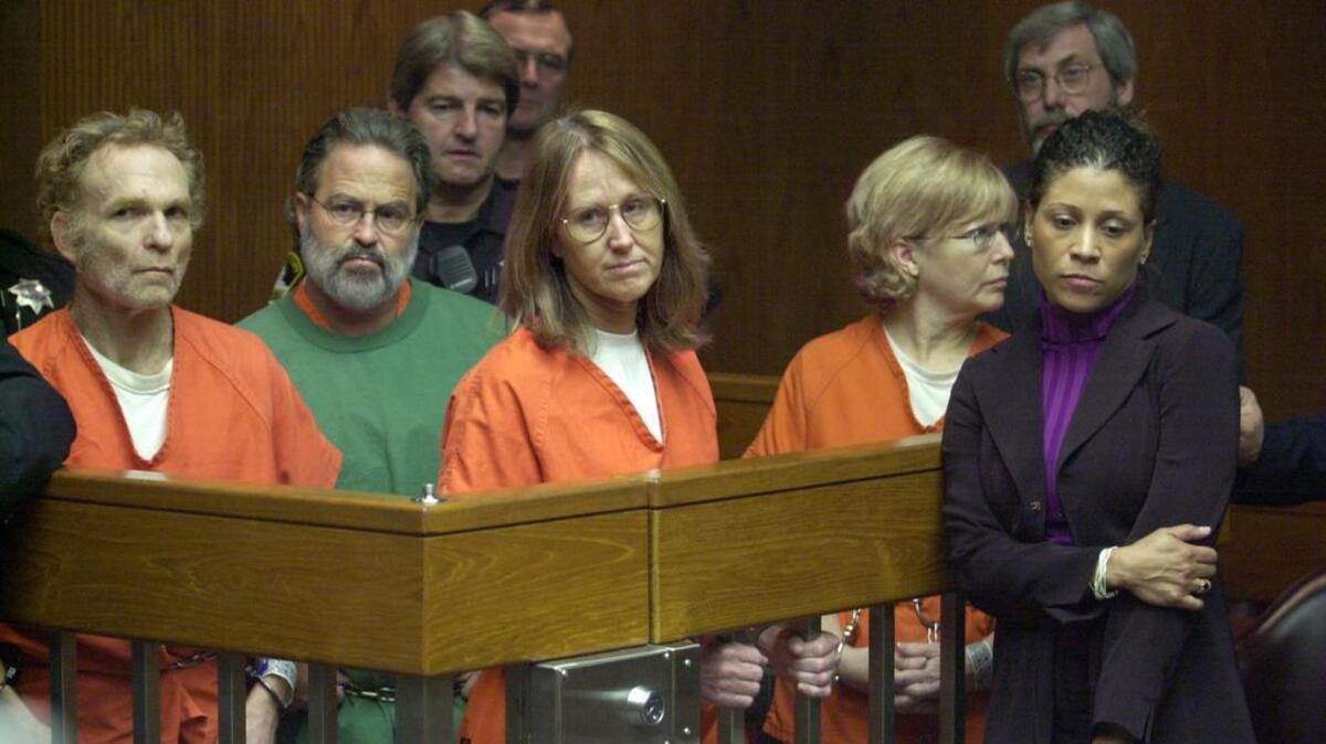 Former SLA members l-r, Michael Bortin, Bill Harris, Sara Jane Olson, and Emily Montague appear at a hearing in Sacramento Superior Court Monday. Their request that their cases be heard together was granted. At right is attorney Shawn S. Chapman who represents Olson. The Sacramento Bee/ Anne Chadwick Williams February 11, 2002