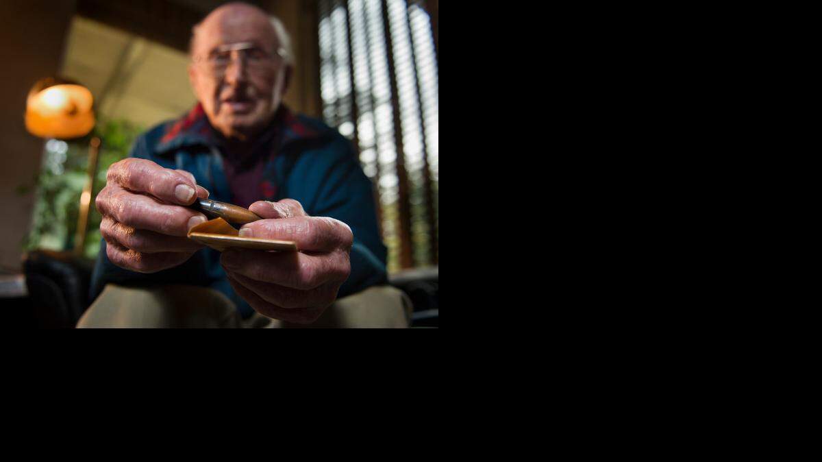 Pearl Harbor survivor Glenn Sorensen holds a Japanese bullet that he pulled from the car he drove on Dec. 7, 1941. <137>narrowly missed him as he reminisces about his experience during WWII at his home in Sacramento on Friday, December 5, 2014. Fired from a Japanese aircraft, the bullet was one of three that hit the sedan he was driving on December 7, 1941. Sorensen, 100, was an Army Air Corps bomber pilot stationed at Hickam Field, Hawaii, the morning of the attack on Pearl Harbor.<137>