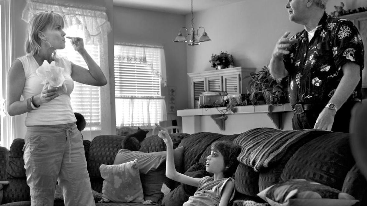 After days of almost no sleep while caring for Derek Madsen, Cyndie French confronts “grandpa” Patrick Degnan, a longtime family friend, about whether he’ll be able to help with rent and funeral expenses as Derek is caught in the middle, on May 1, 2006.