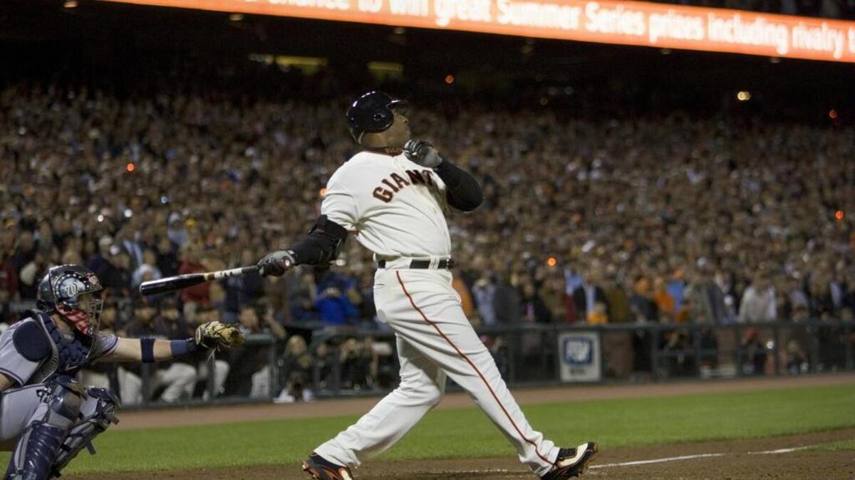 San Francisco Giants slugger Barry Bonds watches home run number 756 leave AT&T Park to break Hank Aaron’s record of 755. Bonds hit a fifth inning fastball pitched by Mike Bacisk of the Washington Nationals on August 7, 2007.