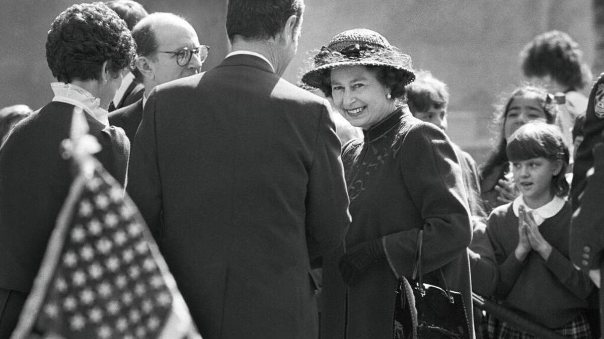 Queen Elizabeth is greeted by California Gov. George Deukmejian outside the State Capitol on Friday, February 4, 1983 in Sacramento, Calif.