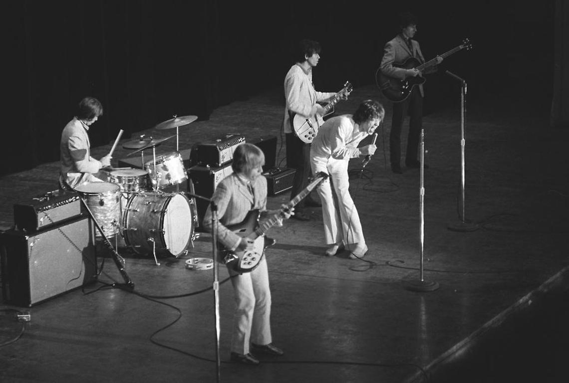 Mick Jagger screams out the lyrics as the Rolling Stones perform at the Sacramento Memorial Auditorium on July 27, 1966, the year after guitarist Keith Richards was nearly electrocuted while performing at the same venue.