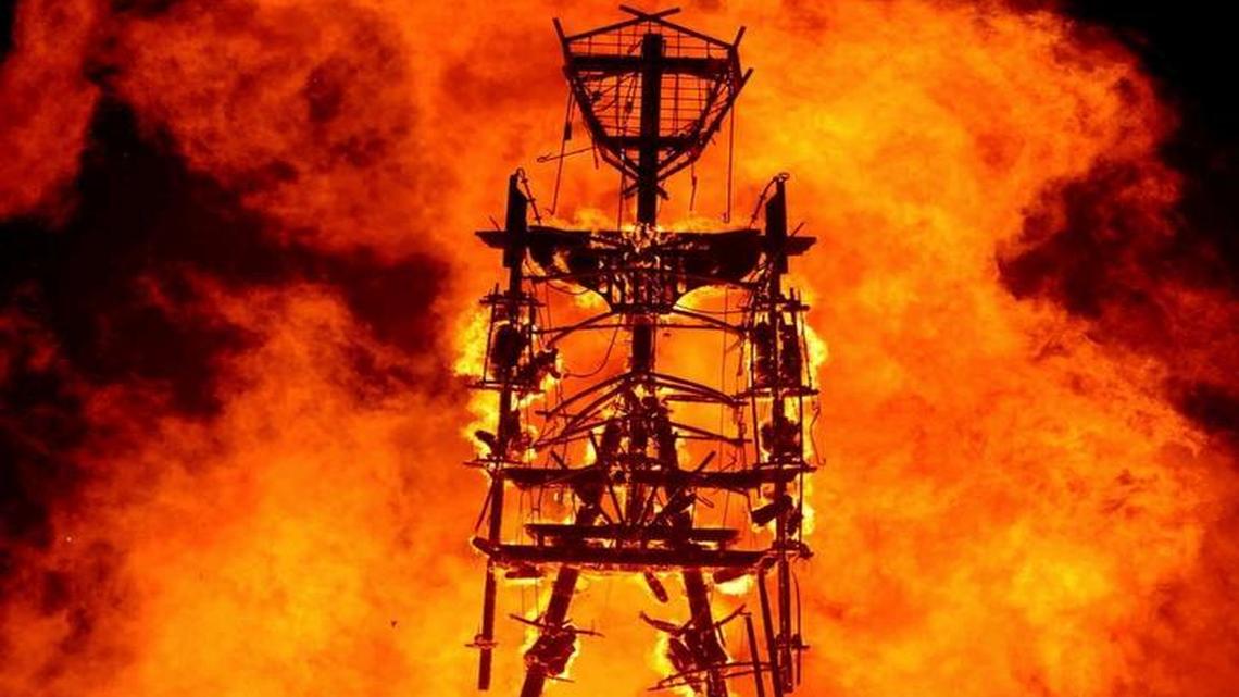 The “Man” burns on the Black Rock Desert at Burning Man near Gerlach, Nev., in 2013. A Nevada sheriff says a man who ran into the flames at the Burning Man festival's signature burning ceremony has died. Pershing County Sheriff Jerry Allen identified the man as Aaron Joel Mitchell, 41, who died Sunday morning at the UC Davis hospital burn center in California.