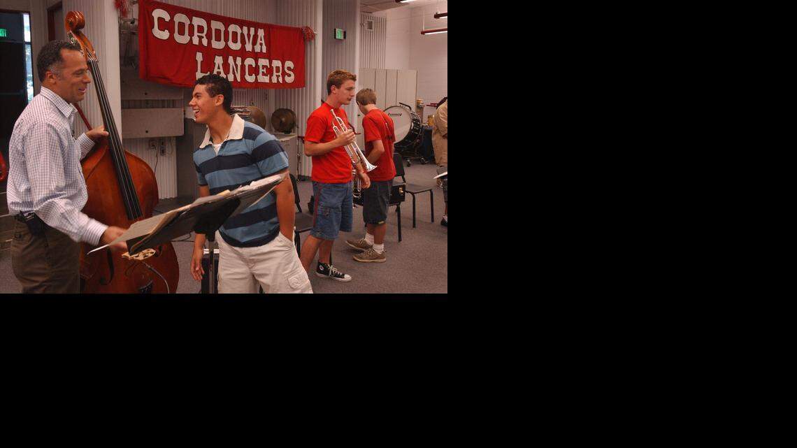 
Cordova High School band drummer Rocky Burris chats with 1977 graduate Lester Holt, left, of NBC News during band rehearsal in May 2004. Holt visited Cordova as part of a “Today Show” segment in which reporters visited their high schools.
