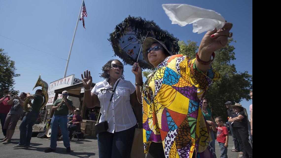 
Aretha Collins of New Mexico, left, dances with Nellie Pierce of Sacramento during the annual Sacramento Music Festival in Old Sacramento on Saturday.
