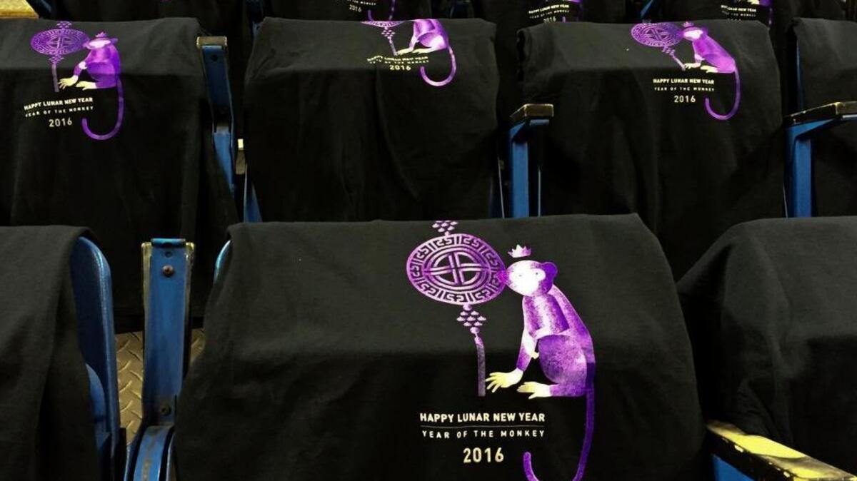 T-shirts fro eh Lunar Year hang on seats on Tuesday, Feb. 1, 2016. Before fans entered for the game against the Milwaukee Bucks, the T-shirts that were placed on every seat were collected and put in large piles. The shirts had a monkey on the front because this is the year of the monkey.