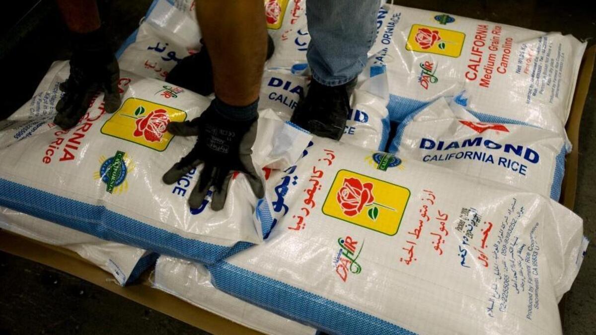 Bags of California Calrose rice are stacked on pallets destined for the Middle East. Tuesday, Jan. 13, 2009.