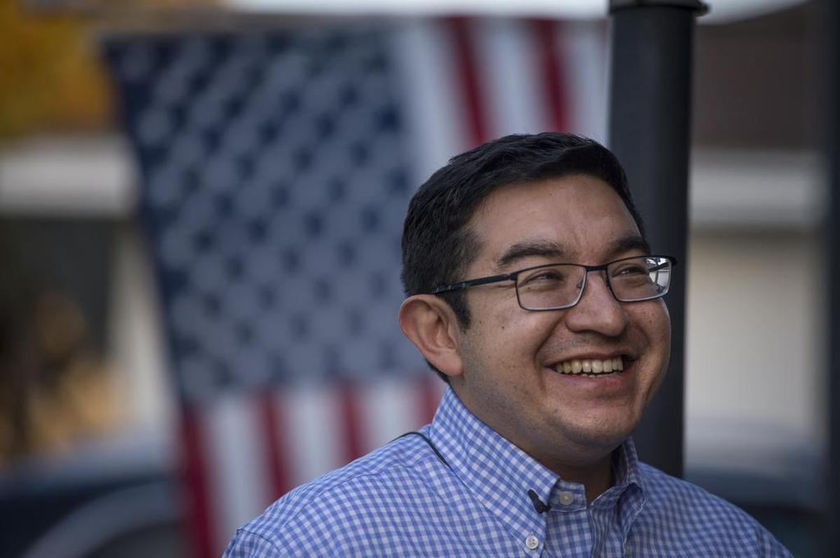 Sacramento City Councilman-elect Eric Guerra, 36, goes door to door to introduce himself as he campaigned on Friday, February 13, 2015. He will be sworn in Tuesday.