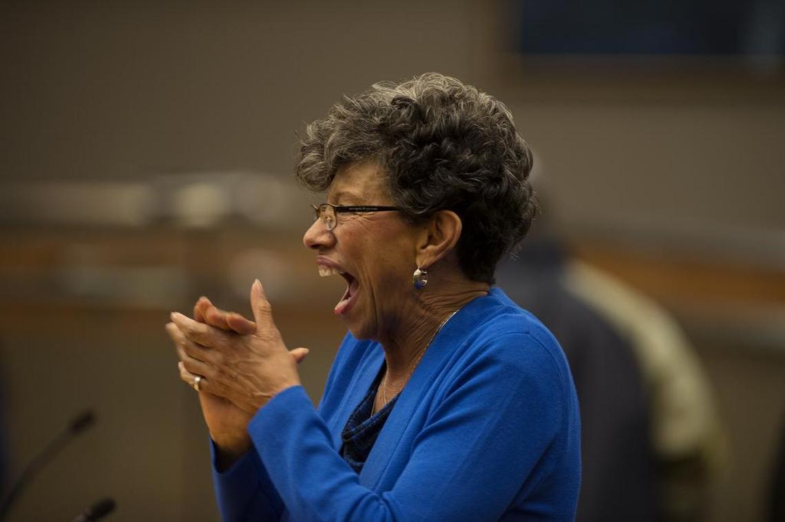 Georgia West, mother of Sacramento Mayor Kevin Johnson, reacts after reciting the Pledge of Allegiance before his final City Council meeting on Dec. 6, 2016.