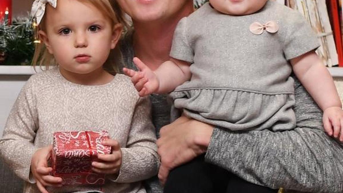 Vadim Anatoliyevich Kondratyuk with his daughters, Vanessa Kondratyuk, left, 2, and Maya Kondratyuk, 11 months. Kondratyuk, 26, died recently of complications from a bad tooth.