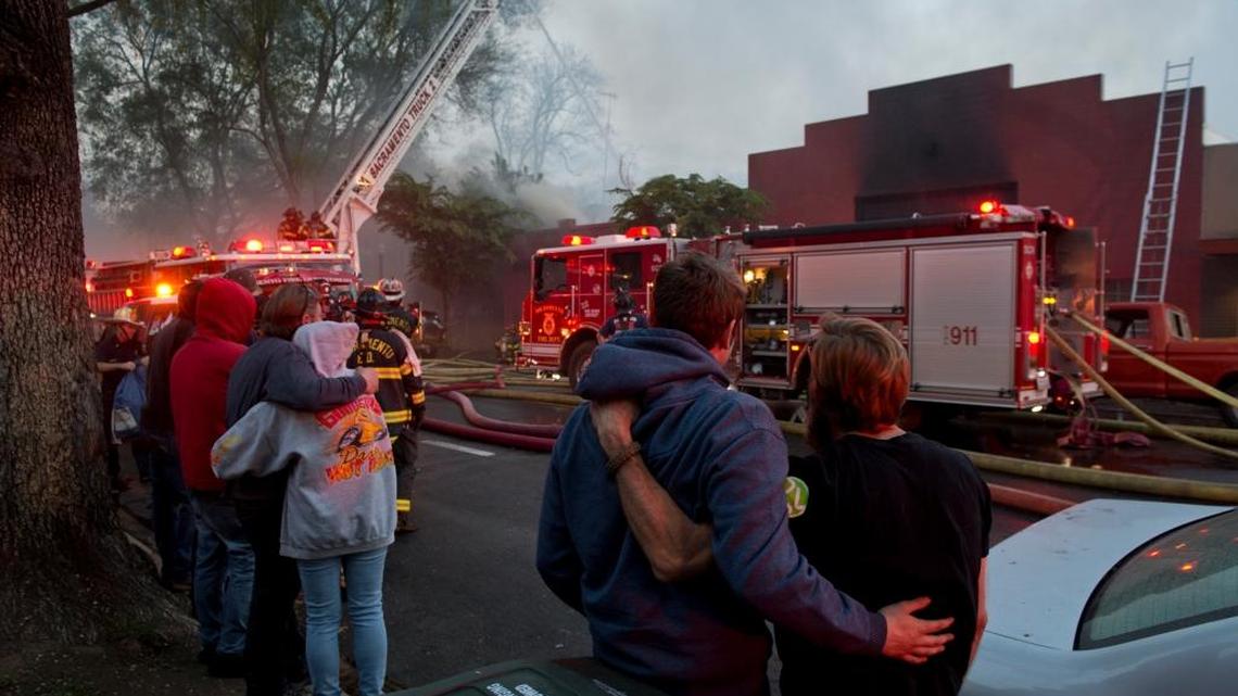 Sacramento firefighters, shown at work at a midtown fire in 2014, take nearly two minutes longer to reach homes and businesses than what national experts recommend, according to new findings released this week.