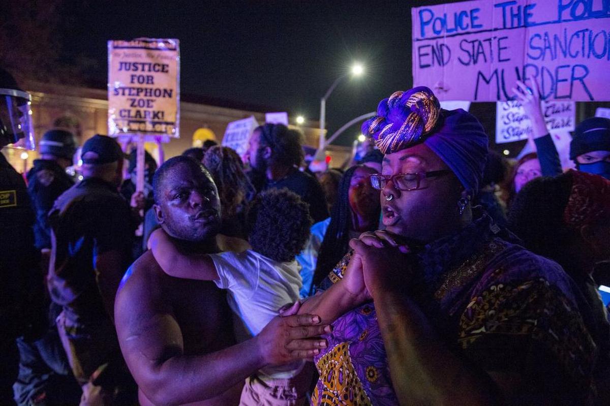 As Sacramento police block the entrance into Old Sacramento at I Street as Black Lives Matters marched through downtown Sacramento on Friday, March 30, 2018 in the wake of private autopsy findings that police shot Stephon Clark in the side and back.