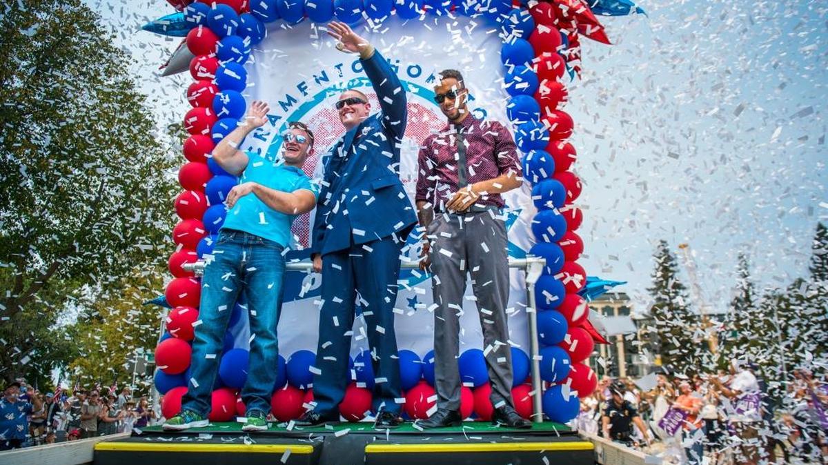 
From left, Alek Skarlatos, Spencer Stone and Anthony Sadler wave to the crowd through confetti during the “Hometown Heroes” parade Friday along Capitol Mall in Sacramento.  The city honored the three men who thwarted a terrorist attack in France on Aug. 21 on a train from Amsterdam to Paris.
