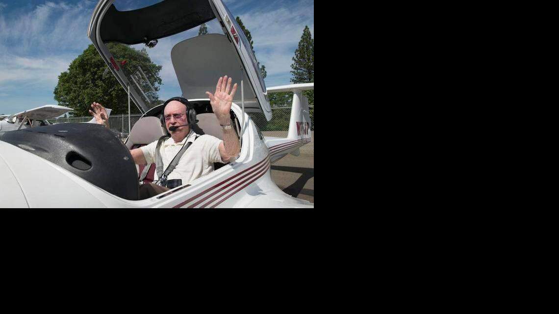 
Peter Weber Jr. waves after completing the flight that put him in the record book.
