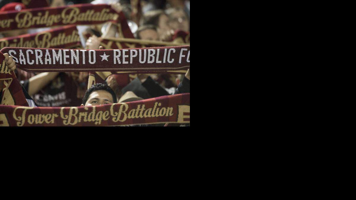 
Tower Bridge Battalion members cheer for the Republic FC during a preseason game between the Sacramento Republic FC and the New York Cosmos at Hughes Stadium on Feb. 28. Sports Illustrated is reporting that Major League Soccer is expected to choose a Minneapolis group for an expansion team, which would diminish Sacramento’s chances for a team. 
