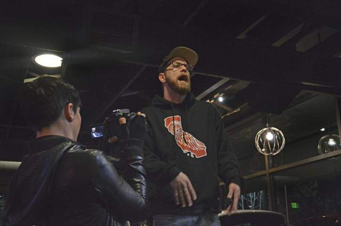 Andru Defeye kicks off the Most Open Mic in the City event at the Hot Italian restaurant on Feb. 3, 2015.