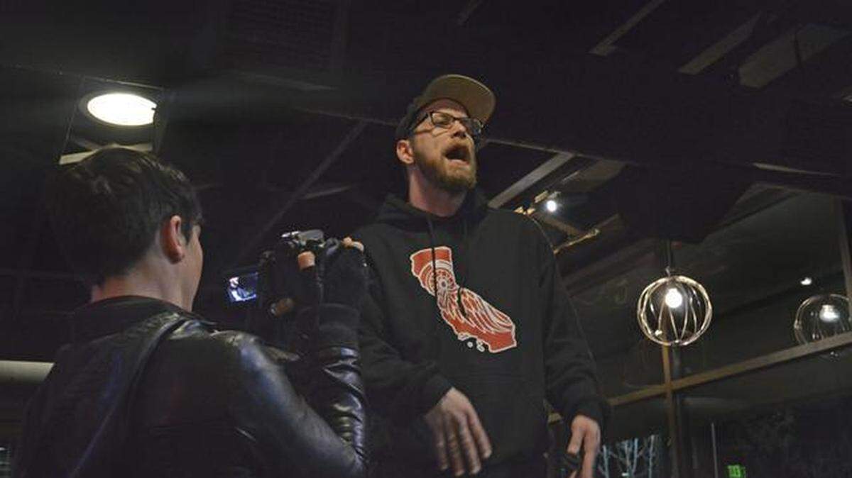 Andru Defeye kicks off the Most Open Mic in the City event at the Hot Italian restaurant on Feb. 3, 2015. 