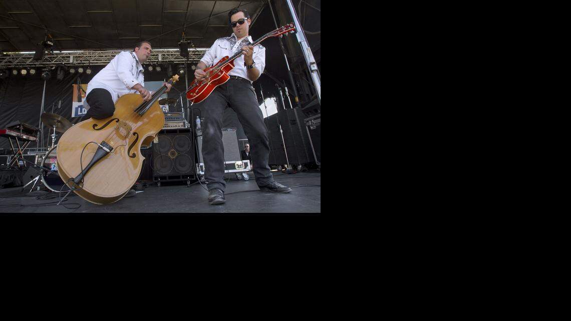 
Memphis Boys bassist Joe Jazdzewski, left, and guitarist Gino Mertegillano perform at the 40th annual Sacramento Music Festival in Old Sacramento in May 2014. After changing its name in 2012 from the Sacramento Jazz Festival and Jubilee, the event aimed to retain some trademark jazz while expanding to reggae, rock, country and American roots music.



