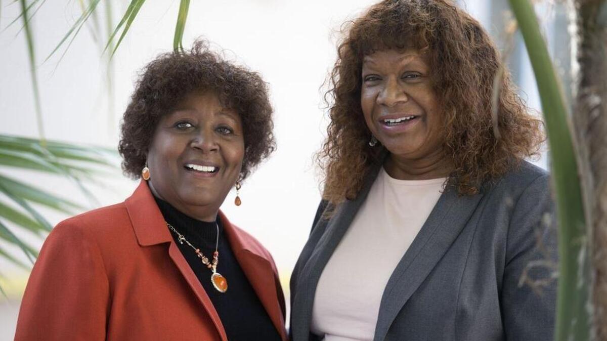 Flossie Crump, left, and Felicia Allen, who in 1974 were the two first female patrol officers sworn in to the Sacramento Police Department, are photographed in Sacramento’s Curtis Park neighborhood on Jan. 30.