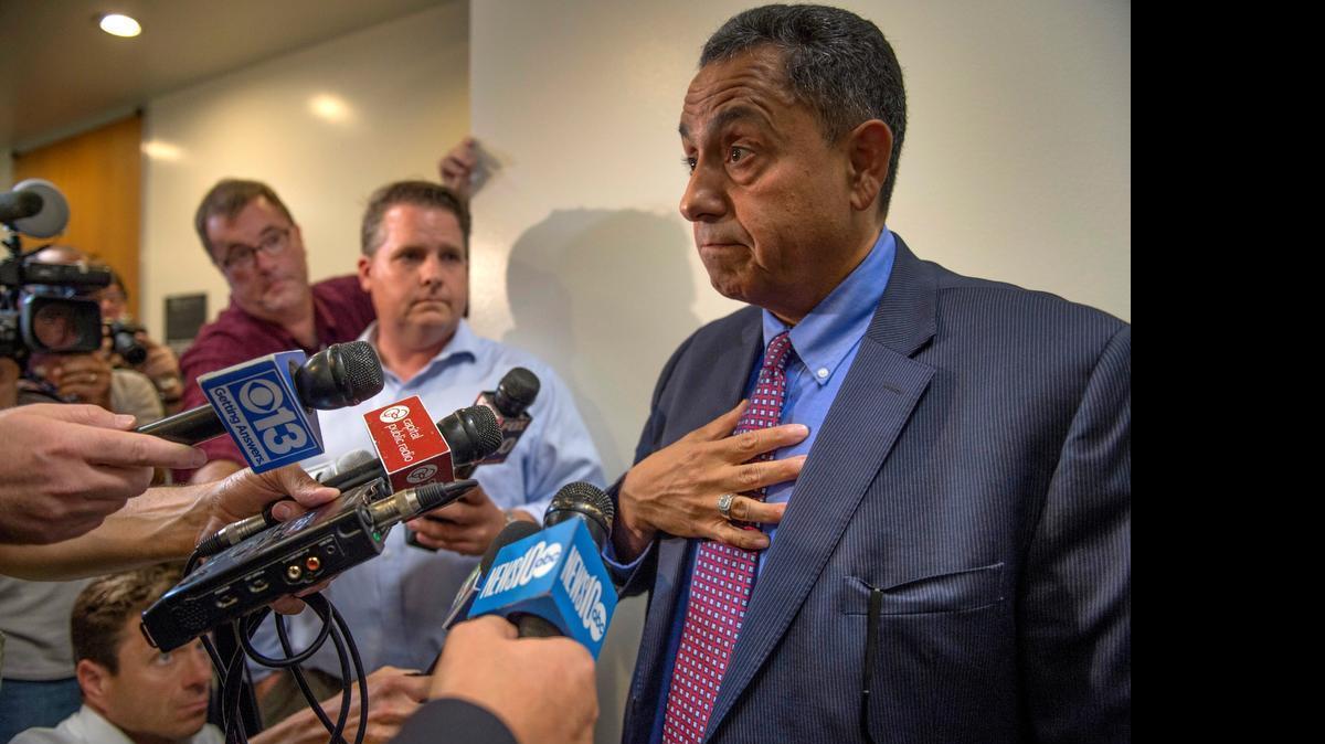 
Sacramento City Attorney James Sanchez talks to the press after a hearing on Mayor Kevin Johnson’s email at Sacramento Superior Court on Thursday.  A legal showdown has been postponed over the potential release of emails between Sacramento Mayor Kevin Johnson and his private attorneys regarding his controversial and short-lived leadership of the National Conference of Black Mayors from May 2013 to May 2014.

