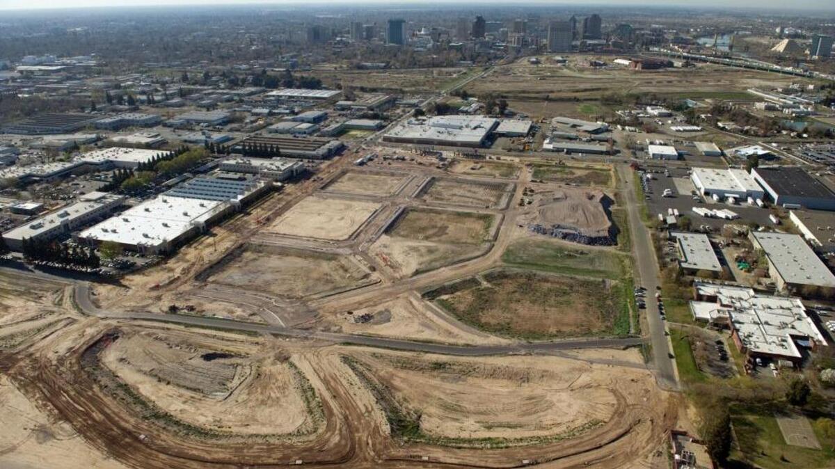 
Hundreds of millions of dollars are being pumped into the area north of downtown Sacramento, as seen in this 2012 aerial photograph of the early development in the Township 9 project, the downtown railyard and warehouses in the River District.
