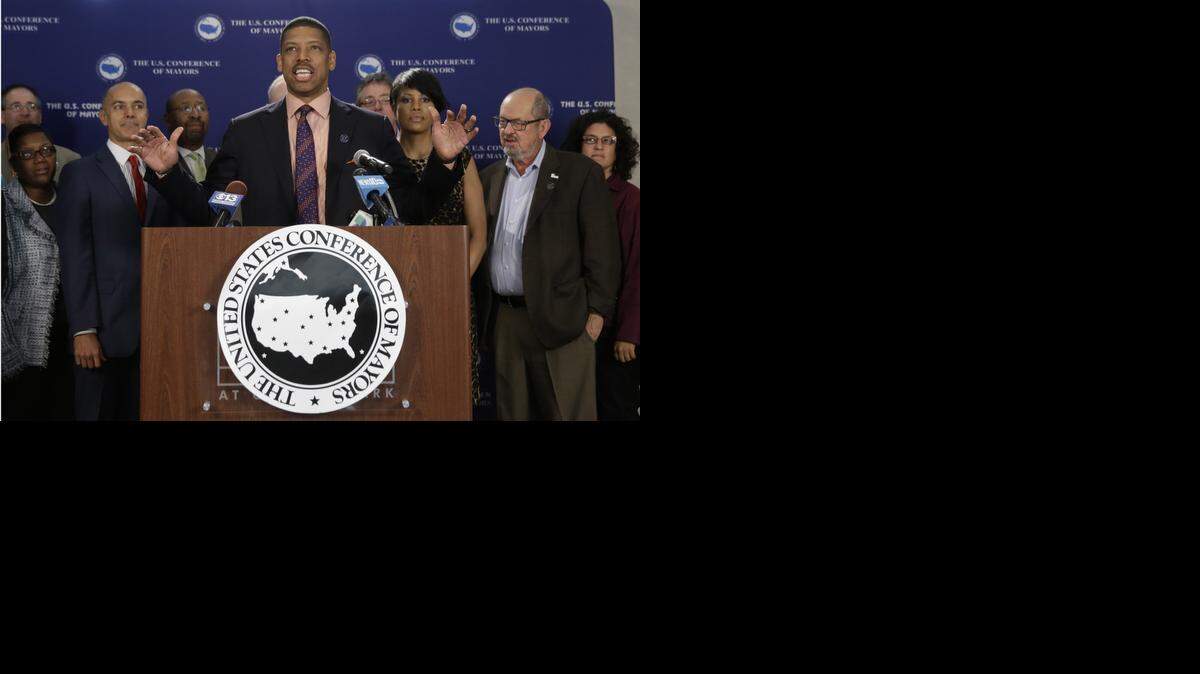 
In this Sept. 29, 2014, photo, Sacramento Mayor Kevin Johnson, president of the United States Conference of Mayors, holds a news conference accompanied by the mayors of other cities, in Sacramento. Johnson is backing a local proposition on the November ballot to increase the powers of the mayor’s office in Sacramento
