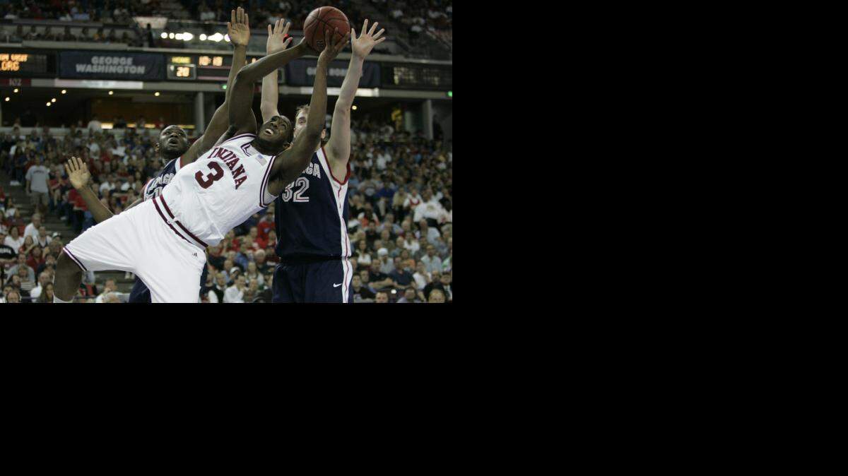 
Indiana’s D.J. White tosses up a shot in front of two Gonzaga defenders at Arco Arena in Sacramento in March 2007. No. 7 seed Indiana won 70-57 to advance to the second round. Sacramento will host first- and second-round games in the NCAA men’s basketball tournament in 2017.
