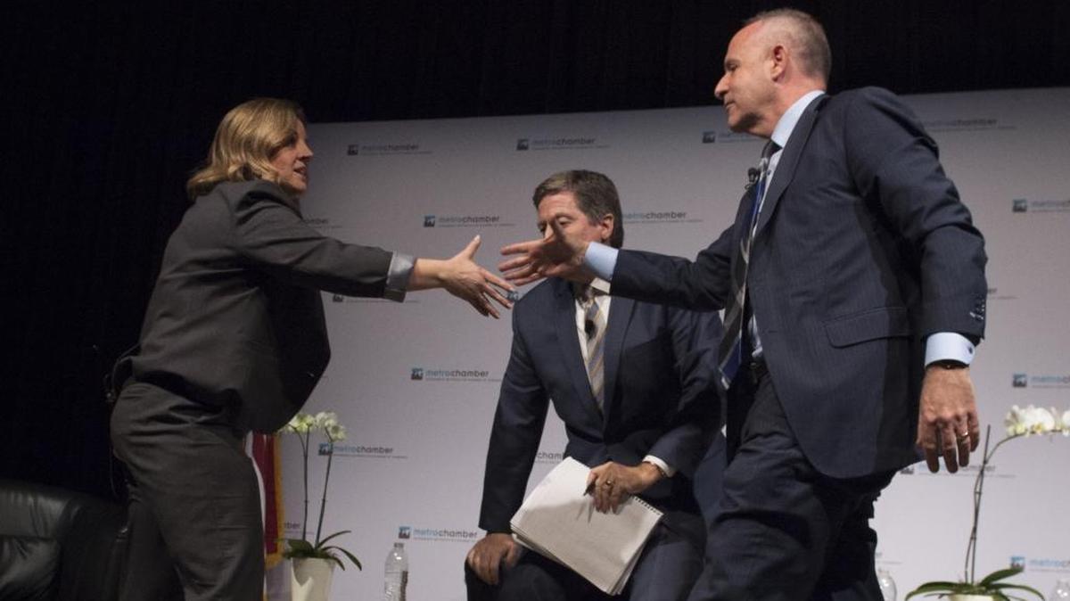 Sacramento mayoral candidates Angelique Ashby, left, and Darrell Steinberg, greeting each other before a forum in January, were joined by Tony Lopez and Russell Rawlings during a forum on Wednesday, April 6, 2016. Ashby and Steinberg made pointed criticisms of each other during the event. Rawlings and Lopez, both considered outsiders to the mainstream political scene, tried to get footholds in the race.