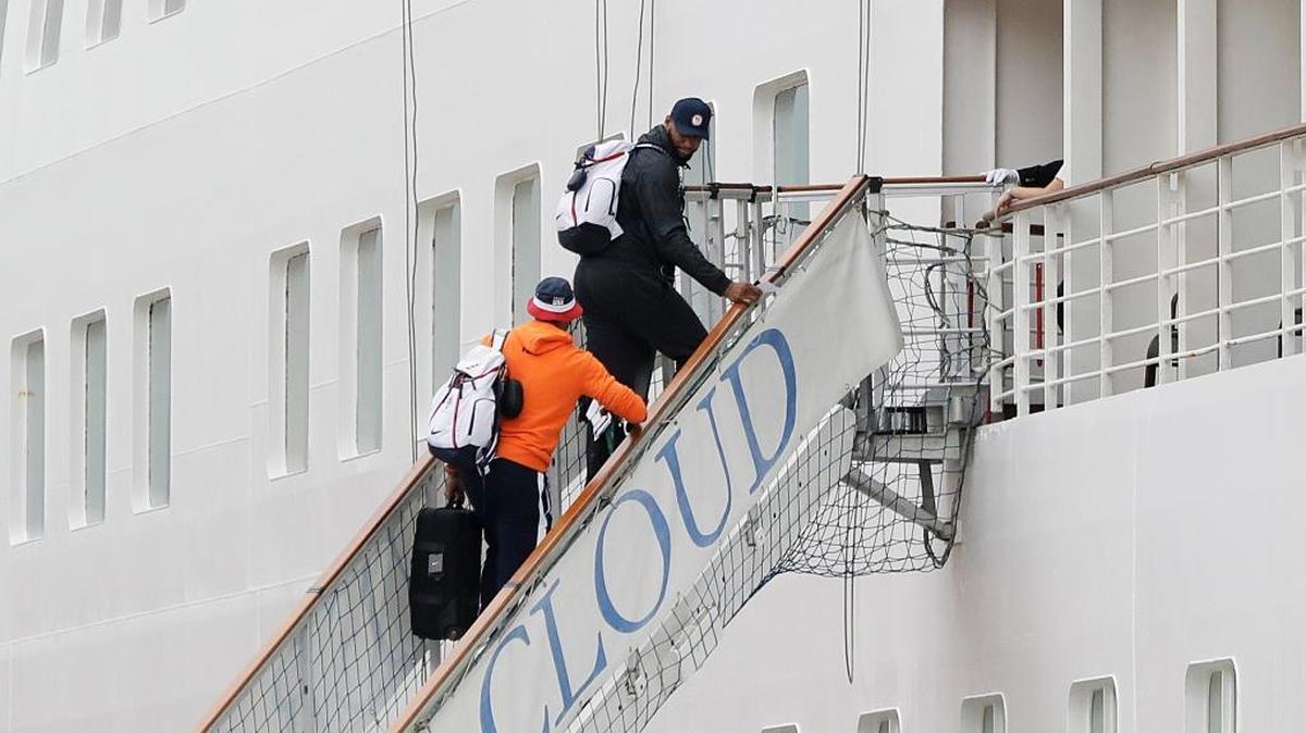 DeMarcus Cousins, center right, and Carmelo Anthony, of the United States men’s basketball team, board the Silver Cloud cruise ship upon arriving for the 2016 Summer Olympics in Rio de Janeiro, Brazil, Wednesday, Aug. 3, 2016. The men’s and women’s team stayed on the ship in the Port of Rio for the duration of the Olympics. (AP Photo/David Goldman)