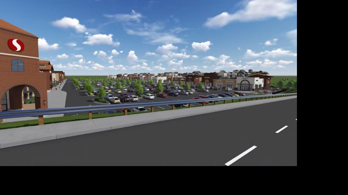 
A frame grab of a virtual tour video of Curtis Park Village with a Safeway. 
