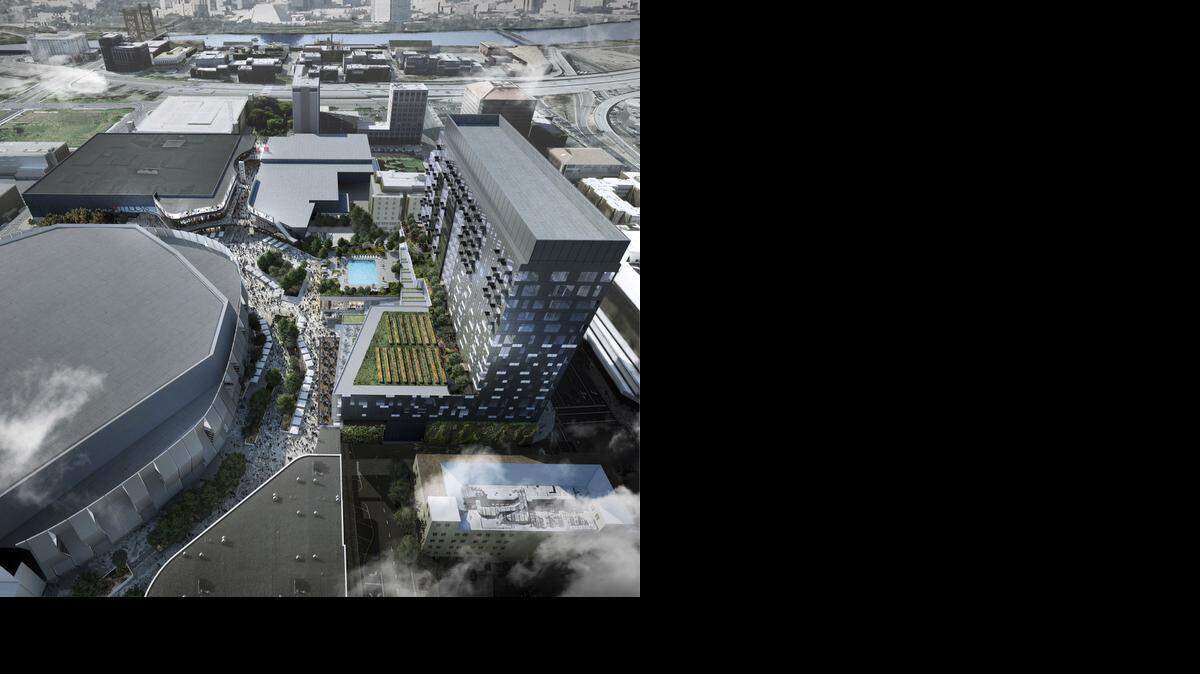
A new drawing released by the Sacramento Kings on Friday shows a planned hotel and residential tower at right, next to the site of a sports arena, left, being built at Downtown Plaza in Sacramento. The development will include retail shops, restaurants and a possible rooftop garden. 
