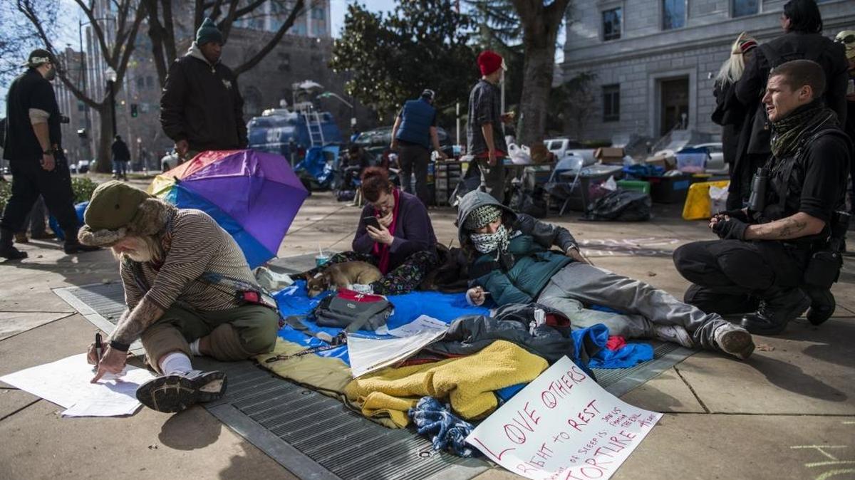 Homeless rights activists occupy Sacramento City Hall grounds during a month-long demonstration on Jan. 8. Someone linked to the group has posted personal information of elected officials on the internet.
