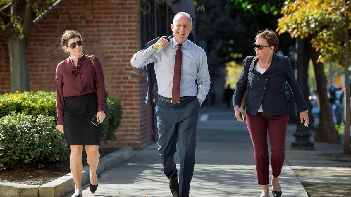 Former California Senate President pro Tempore Darrell Steinberg, center, arrives at a Sacramento luncheon event prior to speaking with members of the press about his possible candidacy for mayor of Sacramento on Thursday, Oct. 22, 2015.