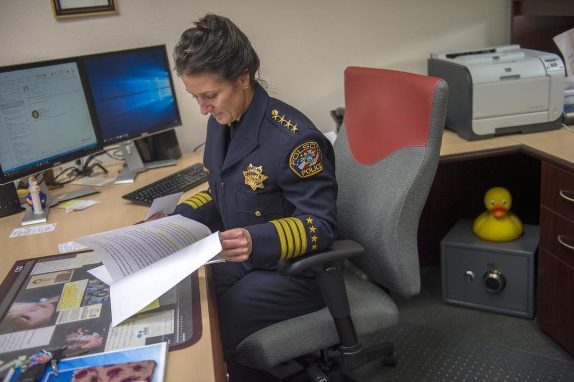 Folsom Police Chief Cynthia Renaud, goes over notes in her office before a ceremony to promote seven of her officers on Feb. 1, 2018.
