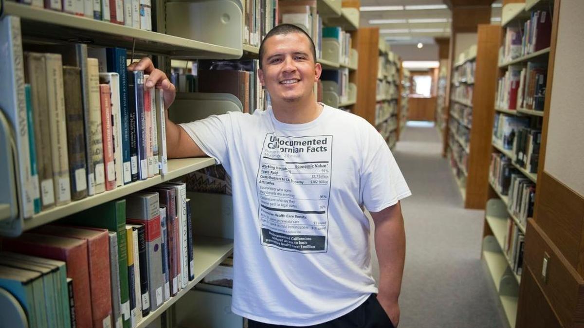 Sacramento City College student Ricardo Lemus, 31, at the school library on Monday, May 16, 2016 in Sacramento, Calif. Lemus used to be a confused young man whose propensity for physical violence landed him two terms of incarceration with the state of California, but he is his class valedictorian and will give a speech during graduation on Wednesday.