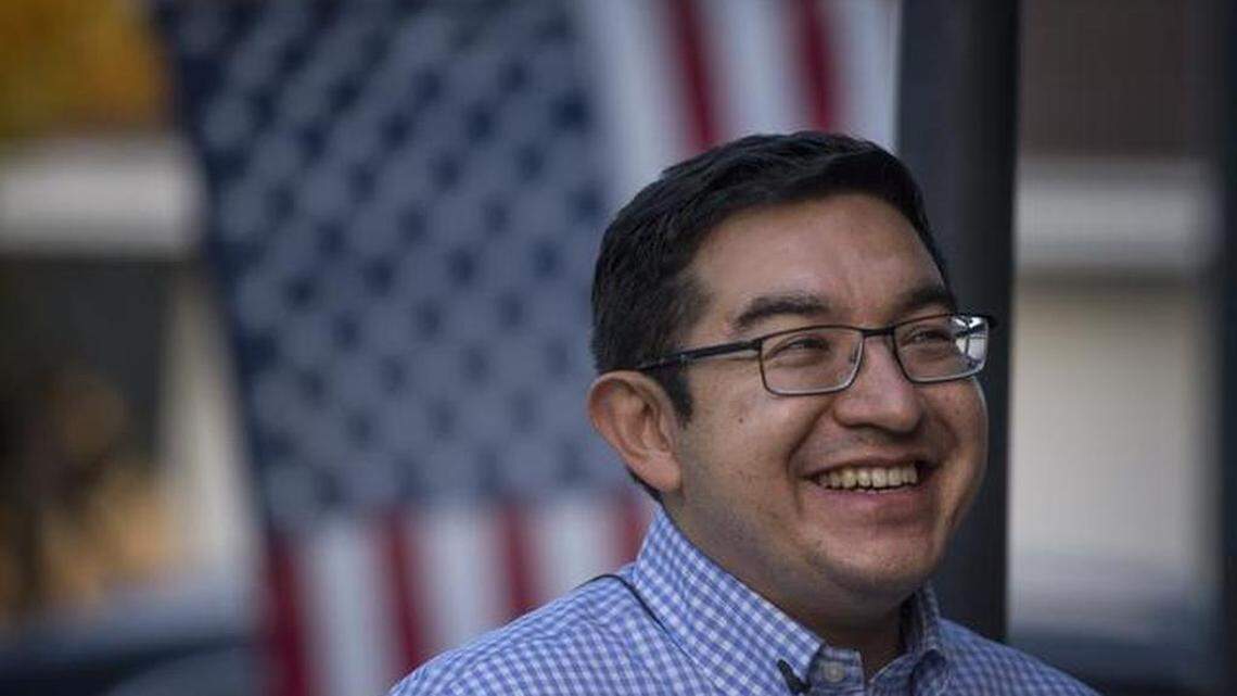 Sacramento City Council candidate Eric Guerra, 36, goes door to door to introduce himself to his constituents in 2015.